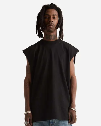 Shaka Wear SHGMT Unisex Garment-Dyed Muscle Tee in Black — blank tank top, front view